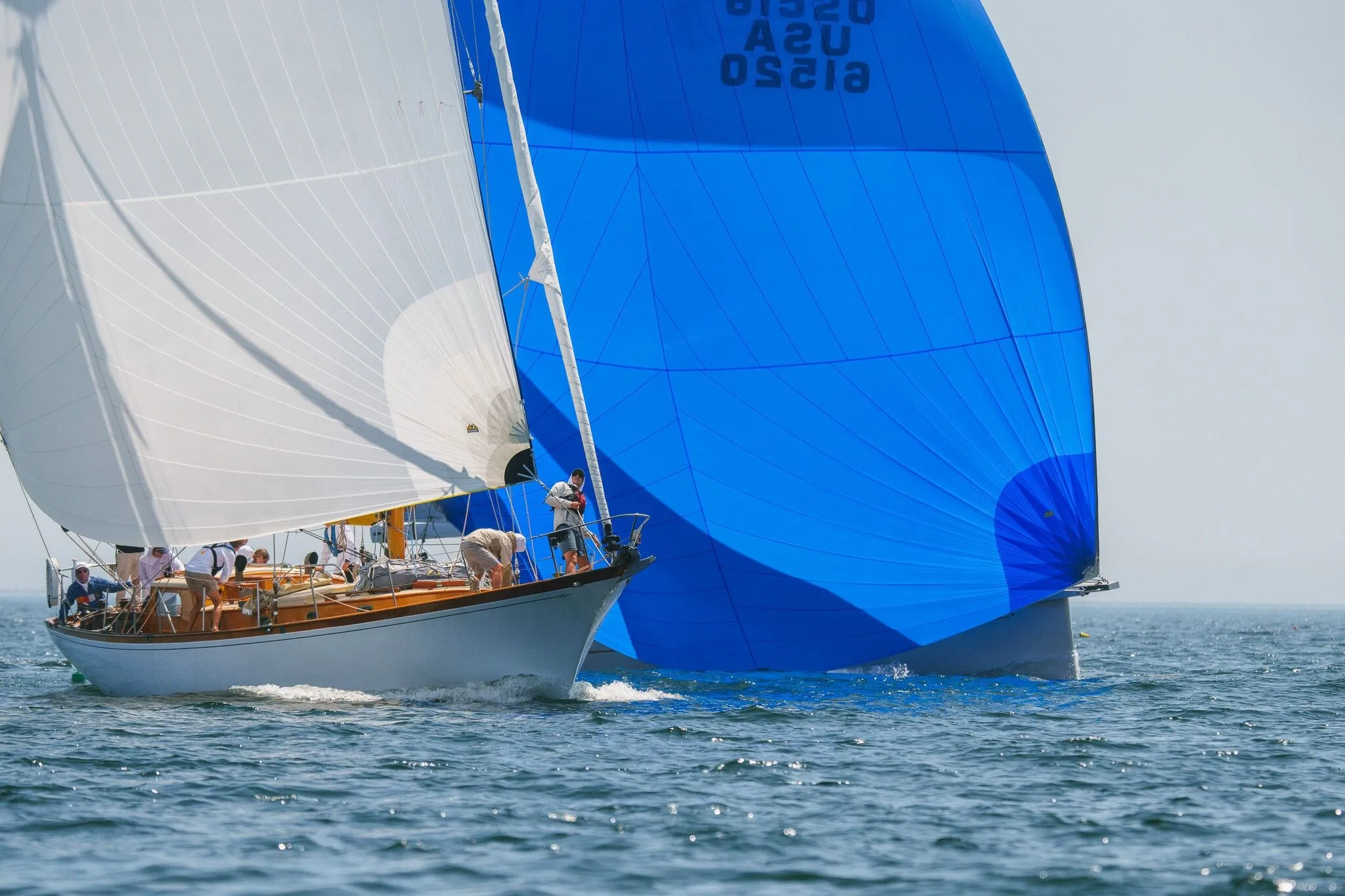 A classic sloop flying a blue spinnaker, Eggemoggin Reach, ME